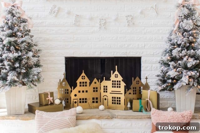 A Pink and Gold Christmas Dream in Our Living Room 13 horizontal photo of a christmas fireplace screen