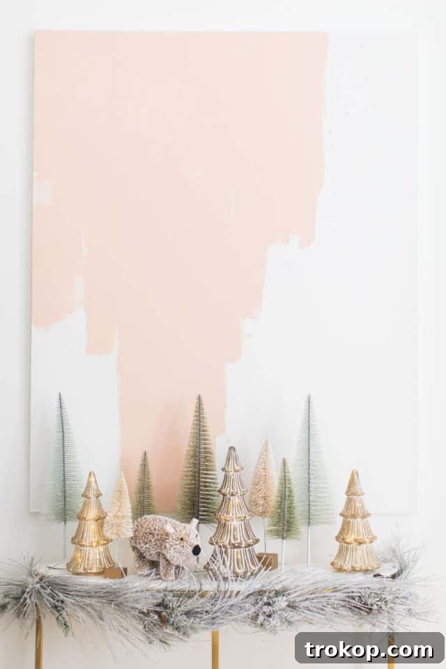 A Pink and Gold Christmas Dream in Our Living Room 14 bottle brush trees and peach abstract artwork