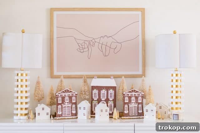 A Pink and Gold Christmas Dream in Our Living Room 10 photo of a pinky swear art print and gingerbread houses