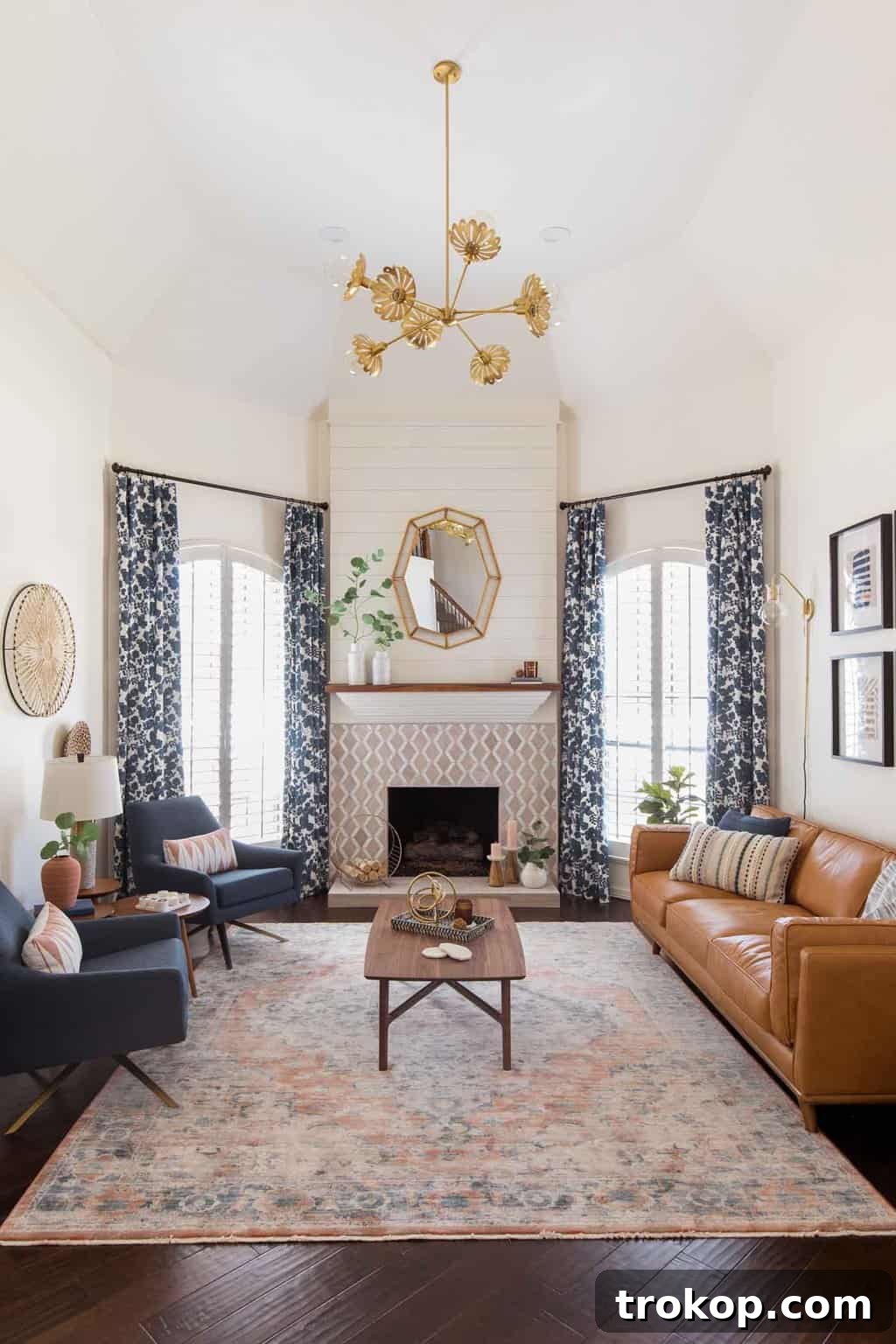 Transitional Living Room Makeover Reveal Stunning after photo of a modern transitional living room makeover by Ashley Rose of Sugar & Cloth, featuring new furniture and a bright, airy feel.