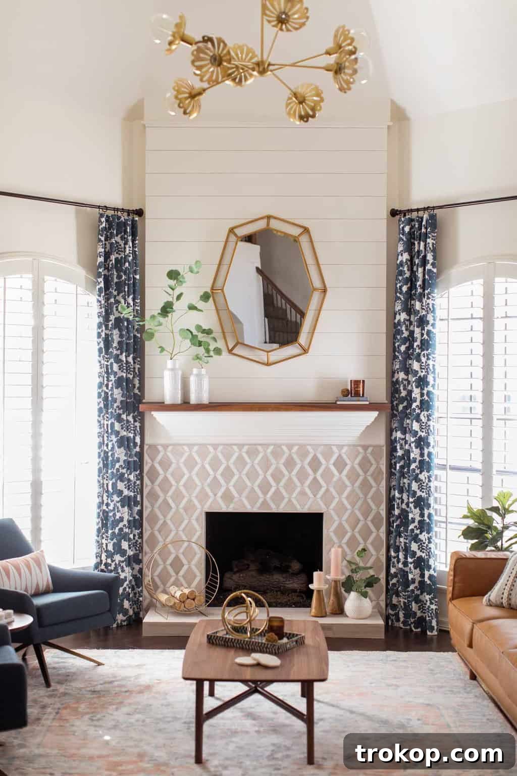 A Transitional Living Room's Stunning Style Transformation 13 Photo showing the new, longer curtains in the living room makeover, demonstrating how they enhance the room's perceived height.