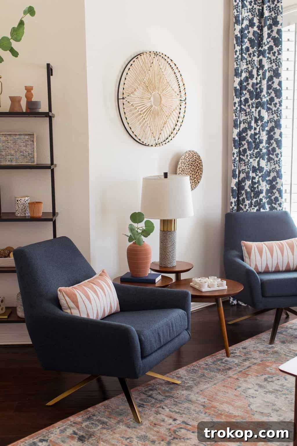 A Transitional Living Room's Stunning Style Transformation 7 After photo showcasing the new, comfortable couches and curated decor in the transitional living room, creating an inviting atmosphere.