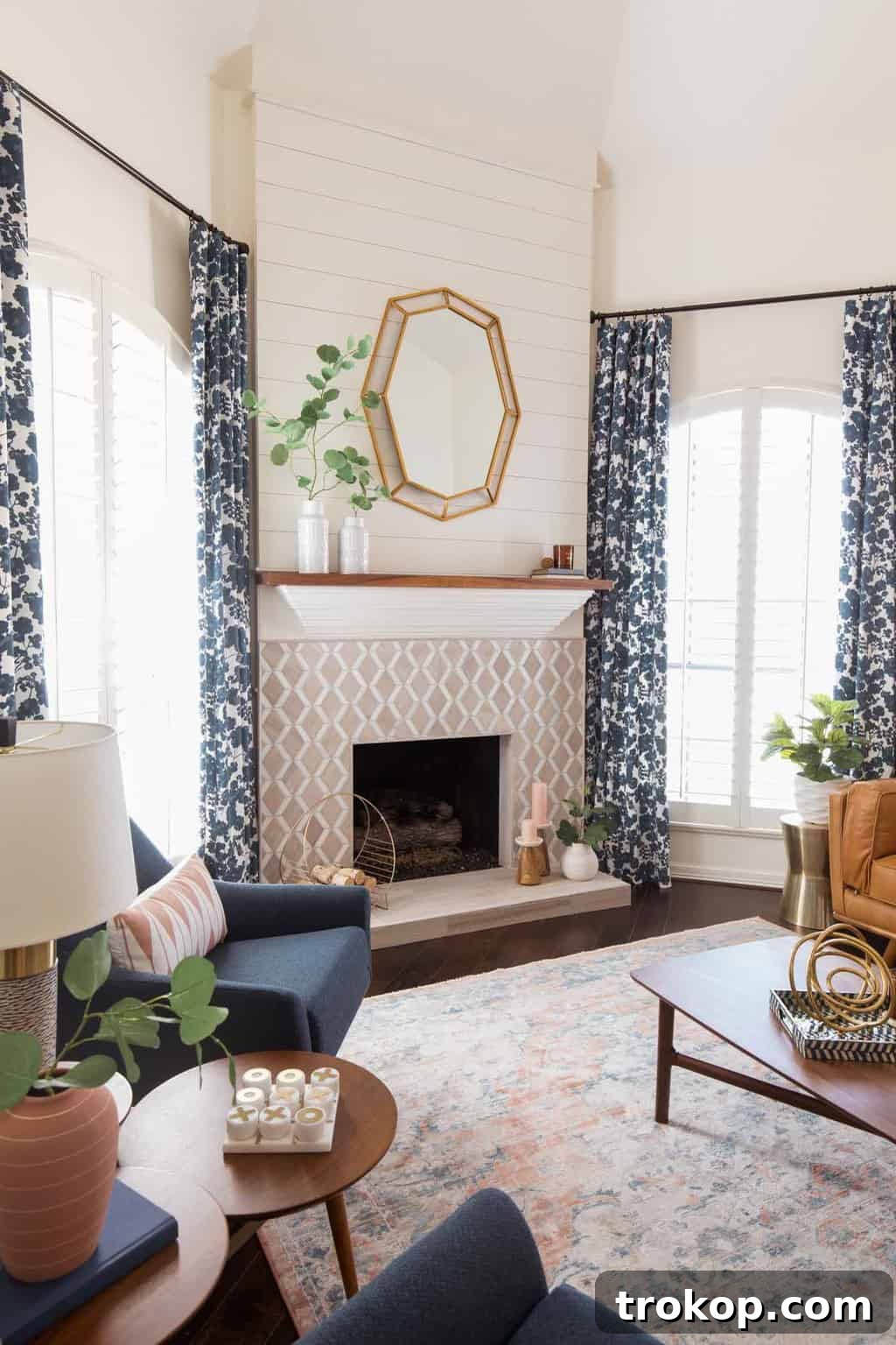 A Transitional Living Room's Stunning Style Transformation 9 Photo highlighting the modern color palette and inviting tones used in the redesigned transitional living room.