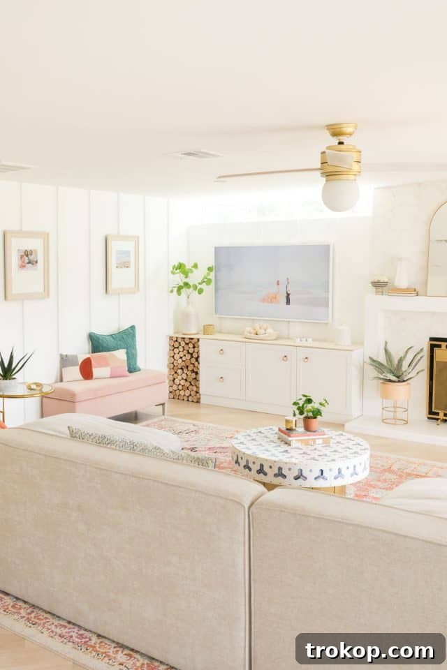 Decorative pillows on a modern sectional sofa with an elegant rug