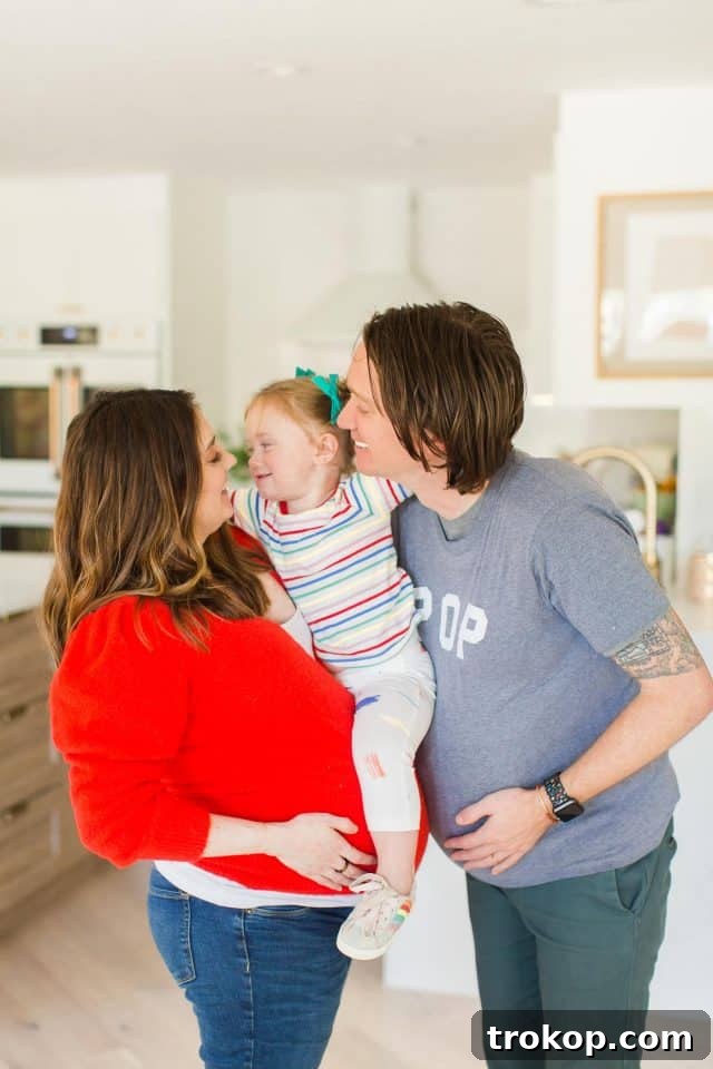 photo at 35 weeks pregnant with my family, smiling together