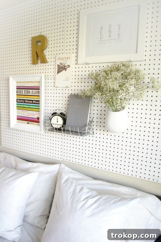 Finished DIY Pegboard Headboard in a Modern Bedroom