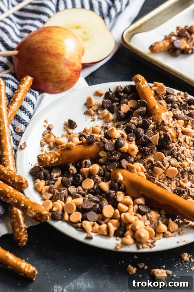 Sweet & Salty Perfection: Chocolate Pretzels and Candy Apples 9 Close up photo of the candy melt mixture for chocolate covered pretzels by Sugar & Cloth