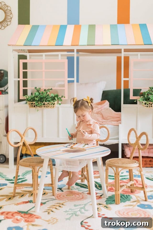Luca's Newborn Journey: Our Favorite Captures 14 Little girl Gwen seated at her toddler table, engaged in play