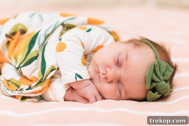 Luca's Newborn Journey: Our Favorite Captures 8 Close-up of newborn baby girl Luca sleeping peacefully
