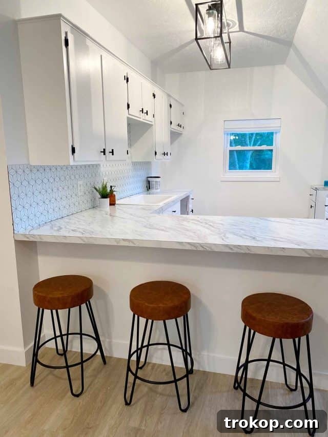 Weekly Highlights: Garage Makeover and Home Finds 2 Bright and airy garage apartment kitchen under renovation, featuring a clean white aesthetic and natural light.