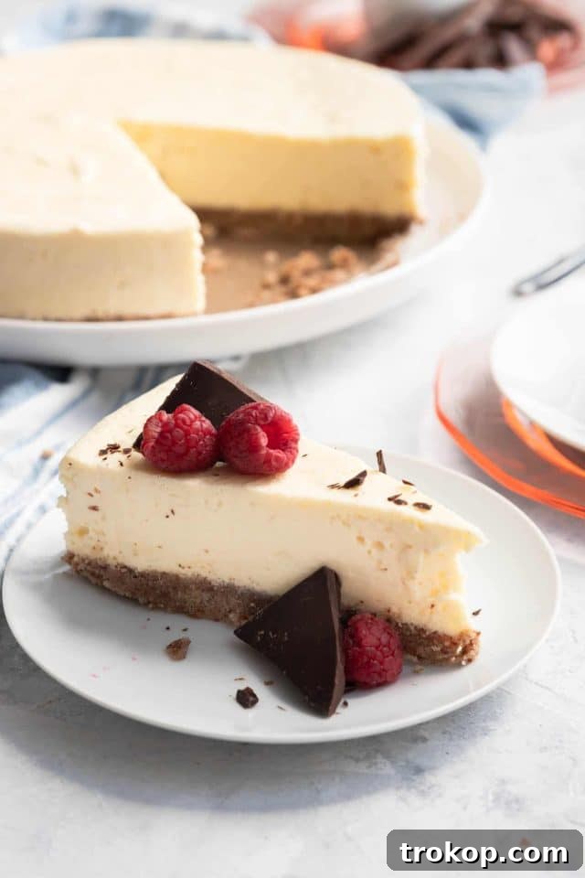 A beautifully sliced healthy keto low carb cheesecake, ready to be enjoyed.