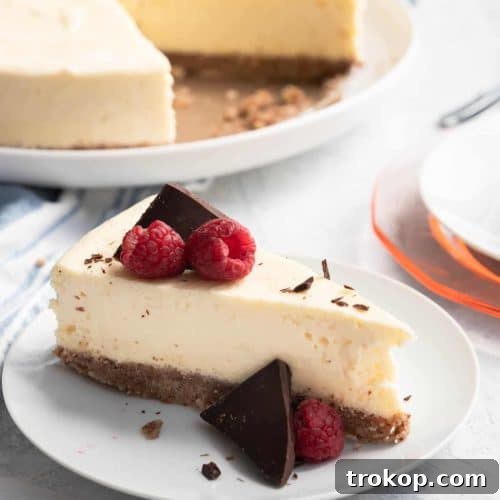 A slice of healthy keto low carb cheesecake, showcasing its creamy texture and delicious appeal.