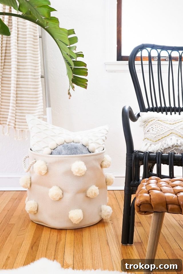 A whimsical DIY Fluffy Pom Pom Bin, perfect for storage and an eco-friendly alternative to traditional gift packaging.