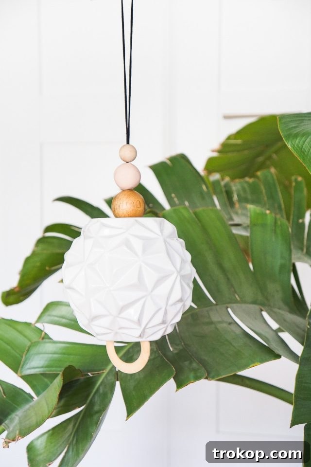 An elegant and easy-to-make Modern Sculptural DIY Wind Chime, bringing positive energy to any outdoor or indoor space.