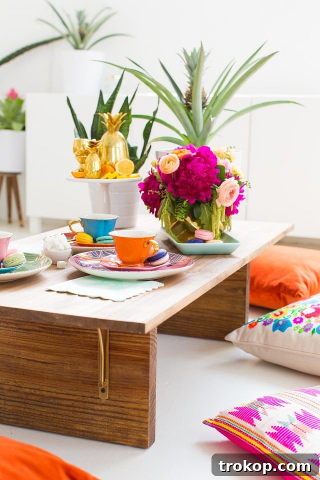 A beautifully styled DIY Floor Table with comfortable floor seating, an impressive and surprisingly easy handmade furniture gift.