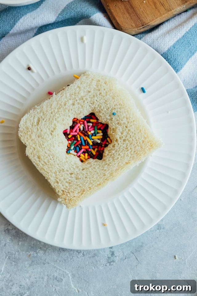 Fairy Bread Delight An inviting image showcasing a fairy bread creation by Ashley Rose of Sugar & Cloth, beautifully styled and ready for serving.