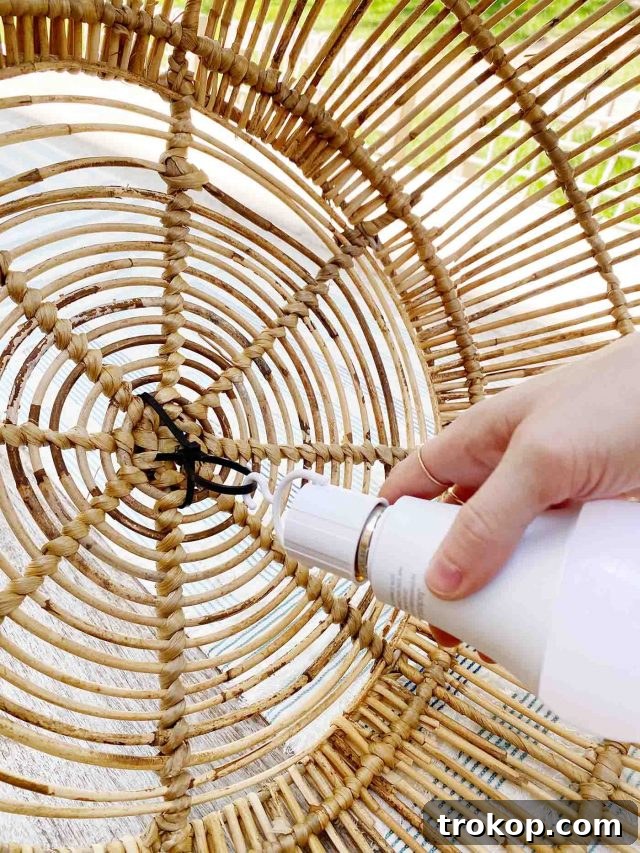 Light Up Your Patio: Cordless DIY Kit 6 Rope strung from house to tree to support the outdoor light.