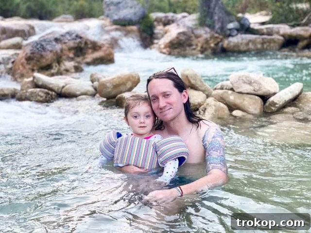 Gwen and Jared sharing a moment during their camping trip at Garner State Park