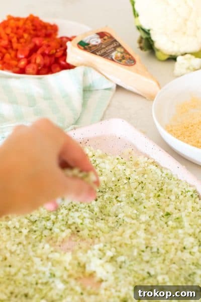 Cauliflower florets in a bowl, prepared for making pizza dough