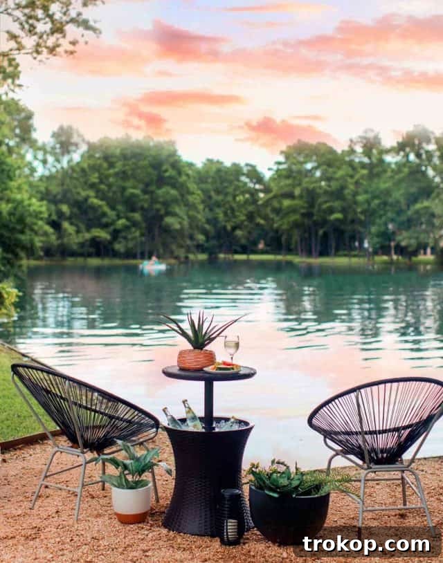 A stylish outdoor cooler with a rustic wooden base, perfect for entertaining guests outdoors.