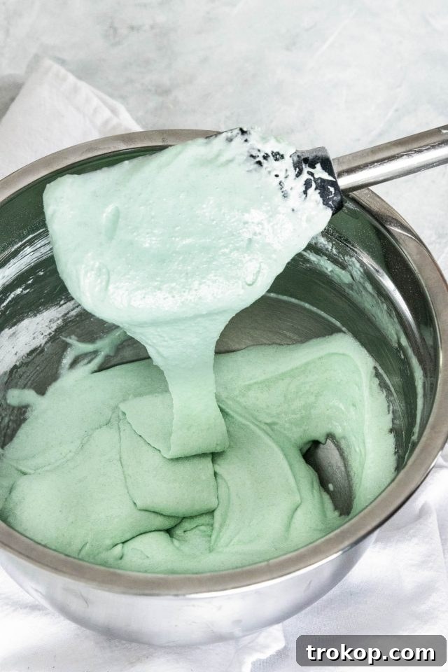photo of with the batter coming off the spatula by top Houston lifestyle blogger Ashley Rose of Sugar & Cloth