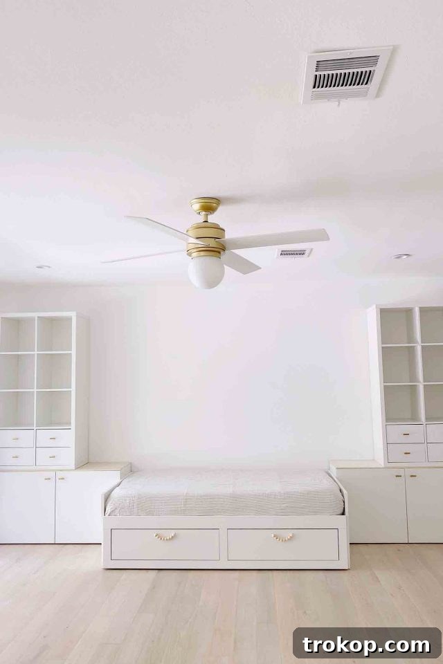 Playroom Makeover: DIY Faux Built-In Cabinets for Organized Fun 7 Ikea Brimnes daybed with Besta cabinets and Kallax storage for a faux built-in look