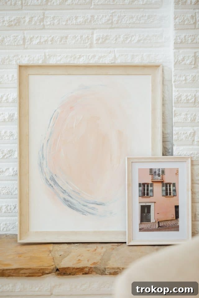 Revitalized Open-Plan Living and Dining Space 13 Custom abstract artwork created for the entrance area, adding a personal touch.