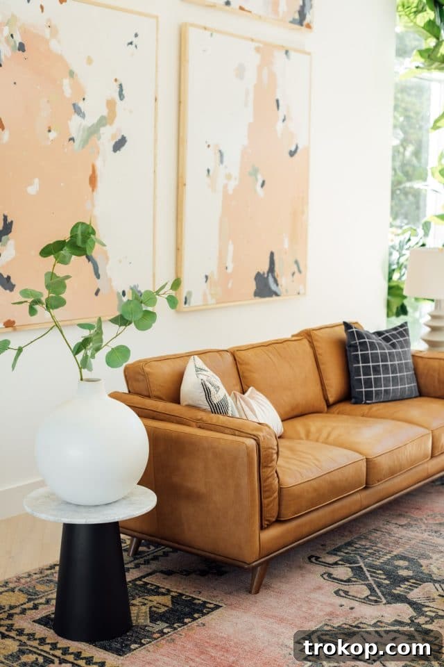 Revitalized Open-Plan Living and Dining Space 14 Pastel circle art paired with a photograph from New Orleans, adding a sentimental touch.