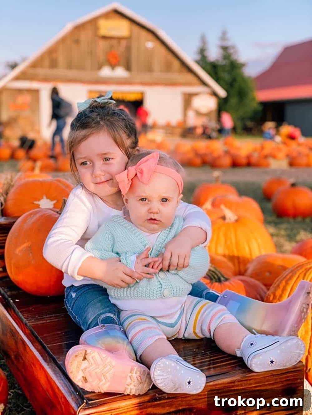 Luca and Gwen enjoying a moment together at the pumpkin patch