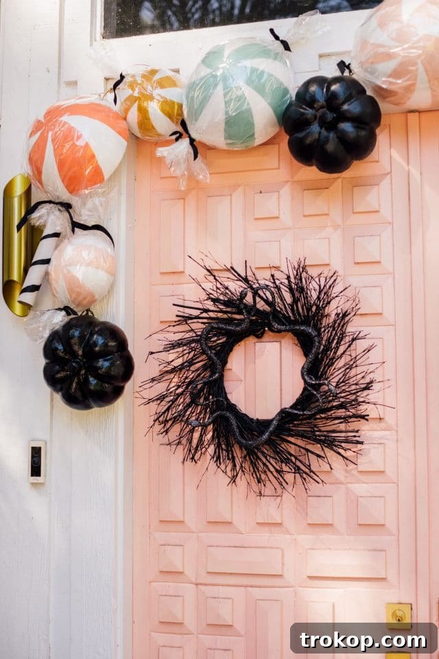 Boo-tiful Door Decor Cute Halloween Candy and Ghosts 12 black halloween wreath and pink front door
