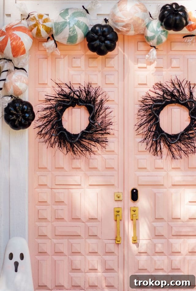 Boo-tiful Door Decor Cute Halloween Candy and Ghosts 15 black front door wreaths on a pink door