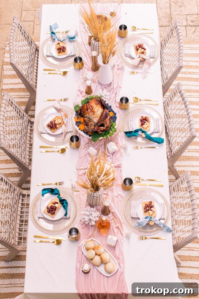 A beautifully set Thanksgiving tablescape featuring warm fall colors, elegant dinnerware, and inviting decor, ready for a family gathering.