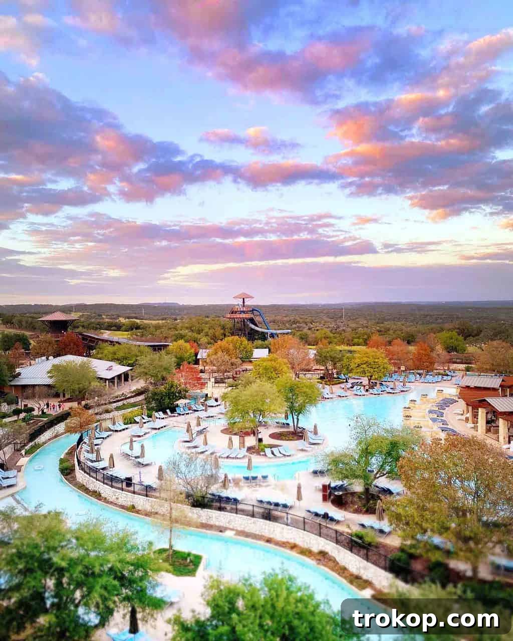 Stunning aerial view of JW Marriott San Antonio Hill Country Resort and Spa, showcasing pools and lush Texas landscape