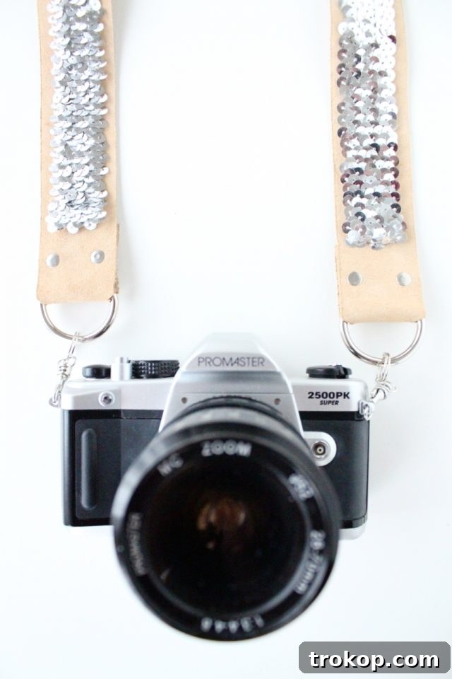 Glamorous DIY no-sew sequin camera strap tutorial by Sugar & Cloth