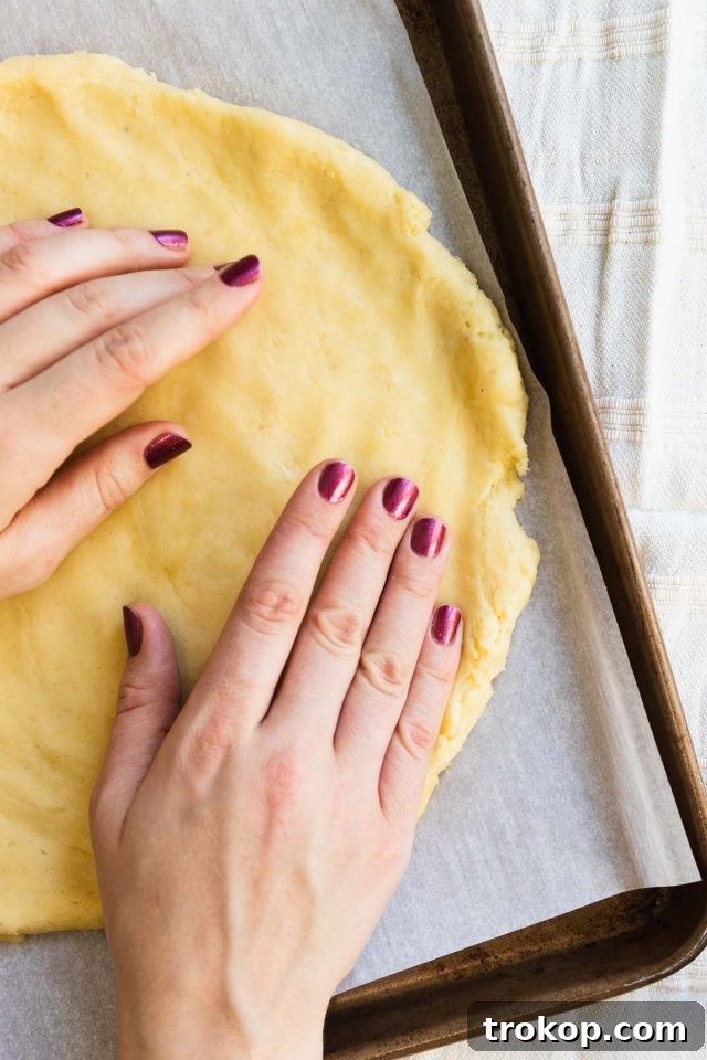 The Perfect Keto Pizza Crust 5 A step-by-step photo guide showing how to prepare the low-carb keto pizza crust dough.