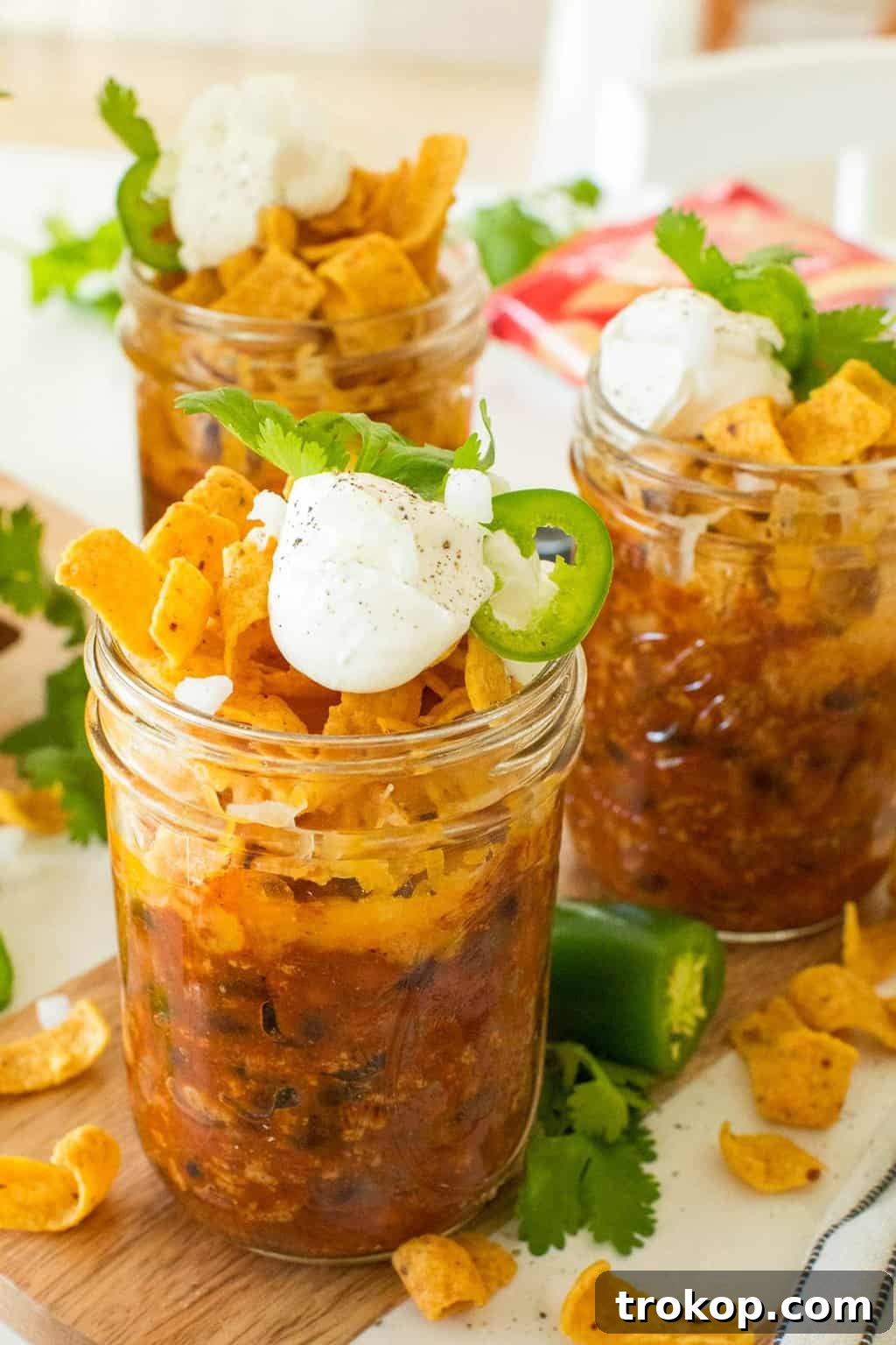 On-the-Go Frito Pie Jars 7 close up photo of the frito pie mason jar recipe by top Houston lifestyle blogger Ashley Rose of Sugar & Cloth