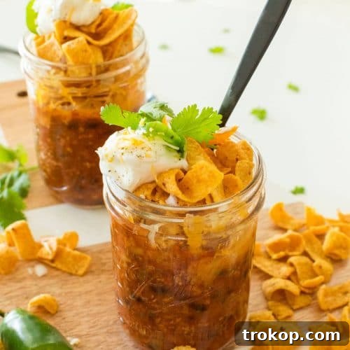 photo of a walking taco frito pie mason jar by top Houston lifestyle blogger Ashley Rose of Sugar & Cloth