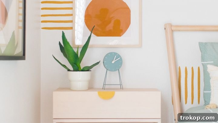 A beautifully painted accent wall in a guest bedroom makeover