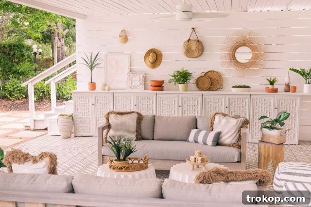 Horizontal photo of outdoor sofas and cabinets styled in the new patio setting