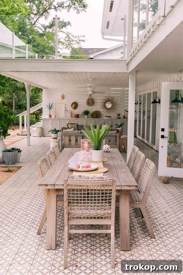 Outdoor dining table set up on the new tiled patio, ready for al fresco meals