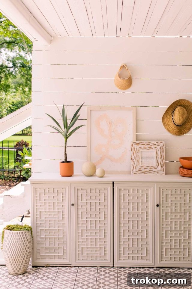 Resin outdoor cabinets in front of a shiplap wall, part of the new patio design