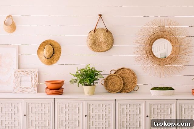 Resin outdoor cabinets providing storage in front of the shiplap wall on the patio