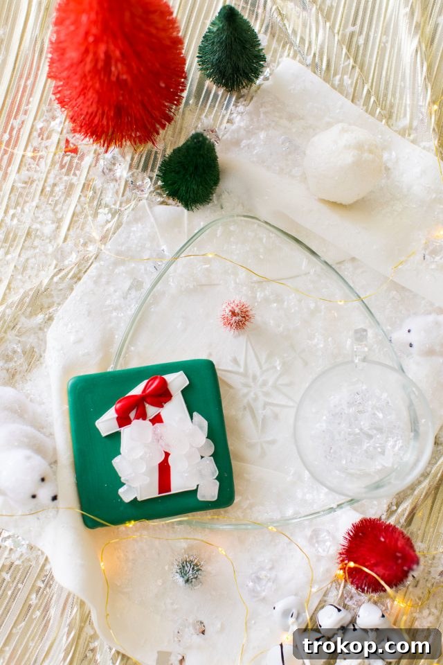 An enchanting icy silver Christmas decor setup, beautifully captured by Ashley Rose of Sugar & Cloth