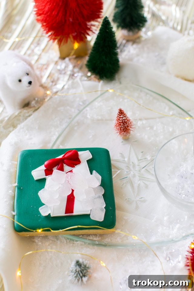 Delicate Swift & Swirl sugar cookies, adding a whimsical touch to the icy silver Christmas aesthetic, crafted for Ashely Rose of Sugar & Cloth