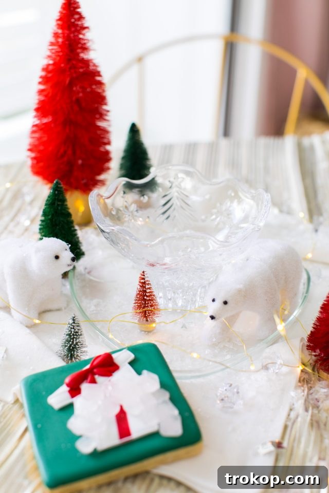 A magical Winter Wonderland setup, inspired by the North Pole, featuring elegant entertaining decor by Ashley Rose of Sugar & Cloth