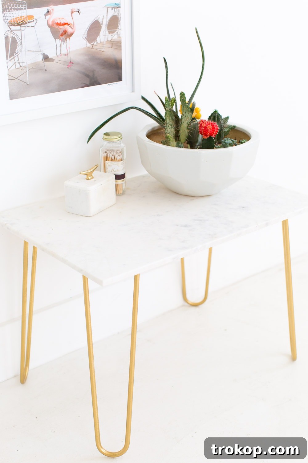 Luxurious DIY Marble Table Top with Gold Accents by Sugar and Cloth, offering chic living room decor.