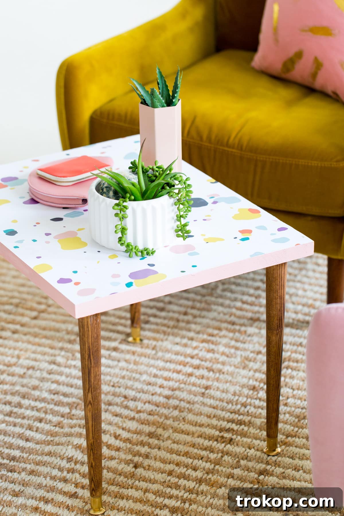 Vibrant Simple DIY Faux Terrazzo Coffee Table adding a pop of color and modern design.