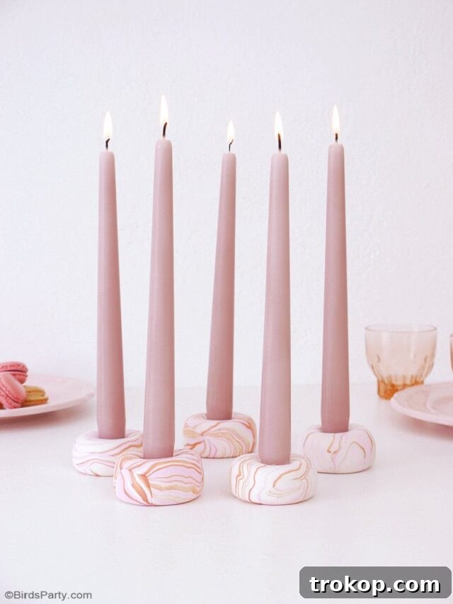 Craft Your Ambiance: 21 DIY Candle Holder Designs for a Colorful Fragrant Home 21 DIY Marbled Taper Candle Holders by Birds Party