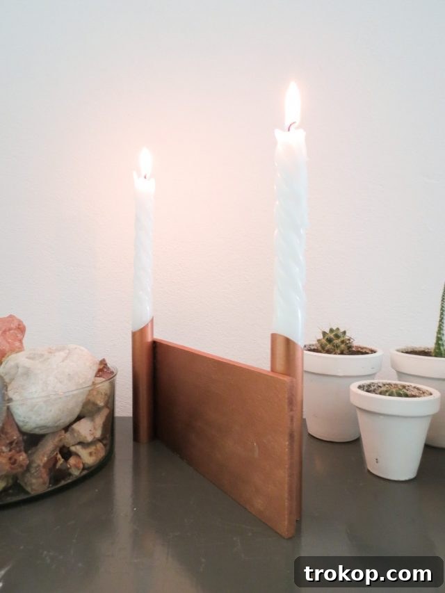 Craft Your Ambiance: 21 DIY Candle Holder Designs for a Colorful Fragrant Home 4 DIY Dual Copper Candle Holder by Ashley Rose of Sugar & Cloth, a top lifestyle blog in Houston, Texas