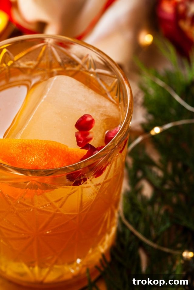 Heirloom Christmas Recipes 8 A beautifully presented Christmas Old Fashioned cocktail, ready to be enjoyed.